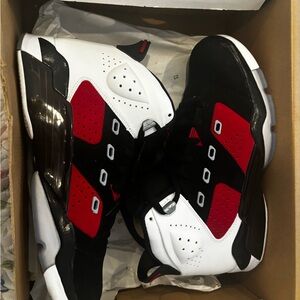 Black and red with white Jordan’s for men size 10.5